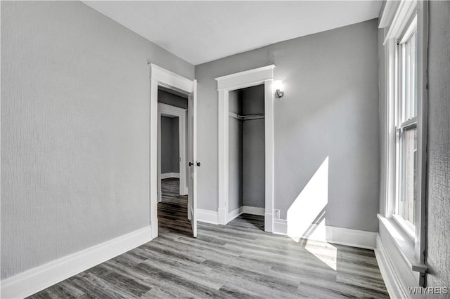 110 Weyand Ave, Buffalo, NY 14210 - unfurnished bedroom featuring wood finished floors and a closet