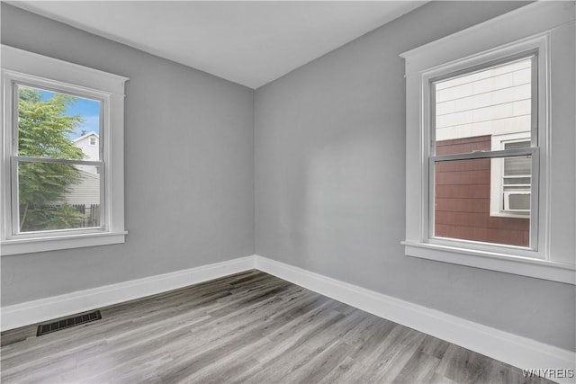 110 Weyand Ave, Buffalo, NY 14210 - unfurnished room with wood finished floors and baseboards