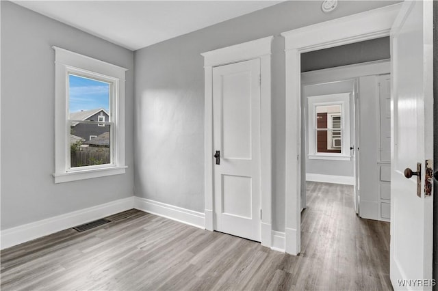 110 Weyand Ave, Buffalo, NY 14210 - unfurnished bedroom with wood finished floors and baseboards