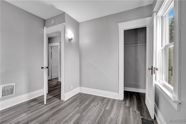 110 Weyand Ave, Buffalo, NY 14210 - unfurnished bedroom featuring wood finished floors and a closet