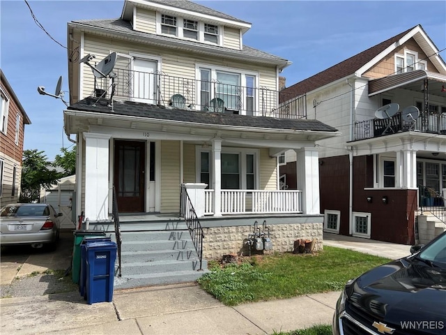 110 Weyand Ave, Buffalo, NY 14210 - american foursquare style home featuring a porch, a balcony, and a shingled roof