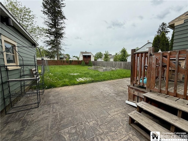 67 Harriet St, Allegany, NY 14706 - fenced backyard featuring a patio