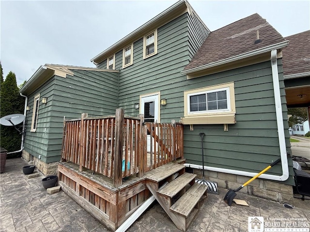 67 Harriet St, Allegany, NY 14706 - back of property featuring a deck and roof with shingles