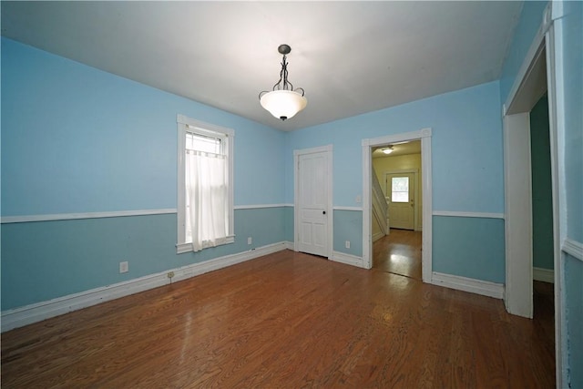 362 Euclid Ave, Elmira-City, NY 14905 - empty room with healthy amount of natural light and wood finished floors