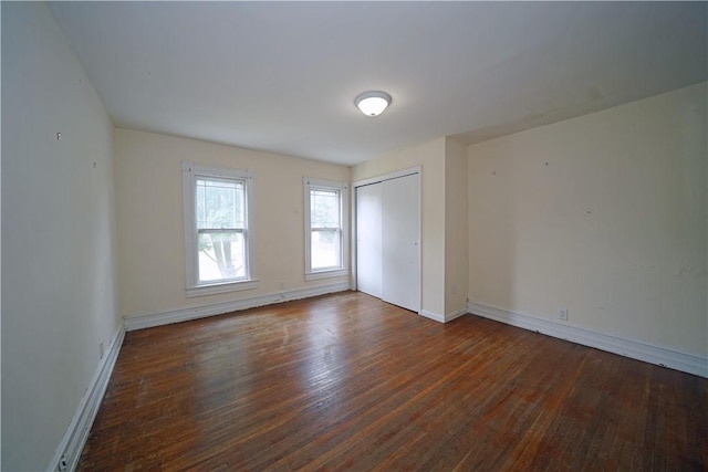 362 Euclid Ave, Elmira-City, NY 14905 - unfurnished bedroom featuring wood finished floors and a closet