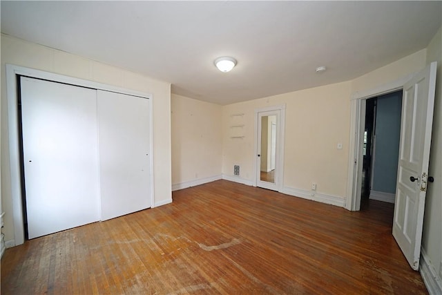 362 Euclid Ave, Elmira-City, NY 14905 - unfurnished bedroom featuring hardwood / wood-style floors and a closet