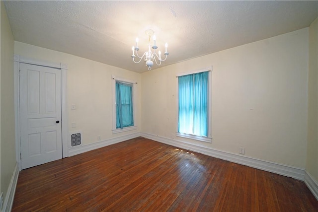 362 Euclid Ave, Elmira-City, NY 14905 - spare room with a chandelier and hardwood / wood-style flooring