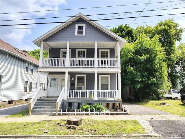 900 Sherman Pl, Utica, NY 13502 - view of front facade featuring a porch and a balcony