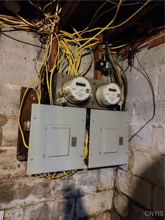 900 Sherman Pl, Utica, NY 13502 - utility room featuring electric panel