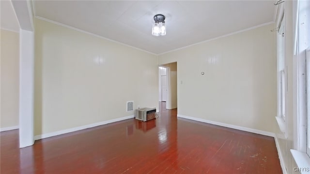 900 Sherman Pl, Utica, NY 13502 - unfurnished room featuring wood finished floors and crown molding