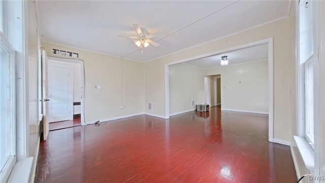 900 Sherman Pl, Utica, NY 13502 - unfurnished room with ceiling fan, crown molding, and wood finished floors