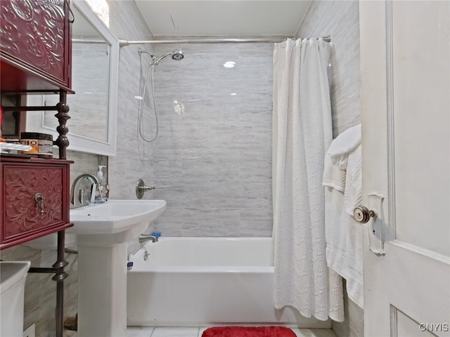 900 Sherman Pl, Utica, NY 13502 - full bathroom with shower / tub combo and tile patterned floors
