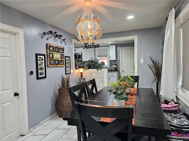 6 Bryant St, Utica, NY 13502 - dining room featuring a chandelier, light marble finish floors, and recessed lighting