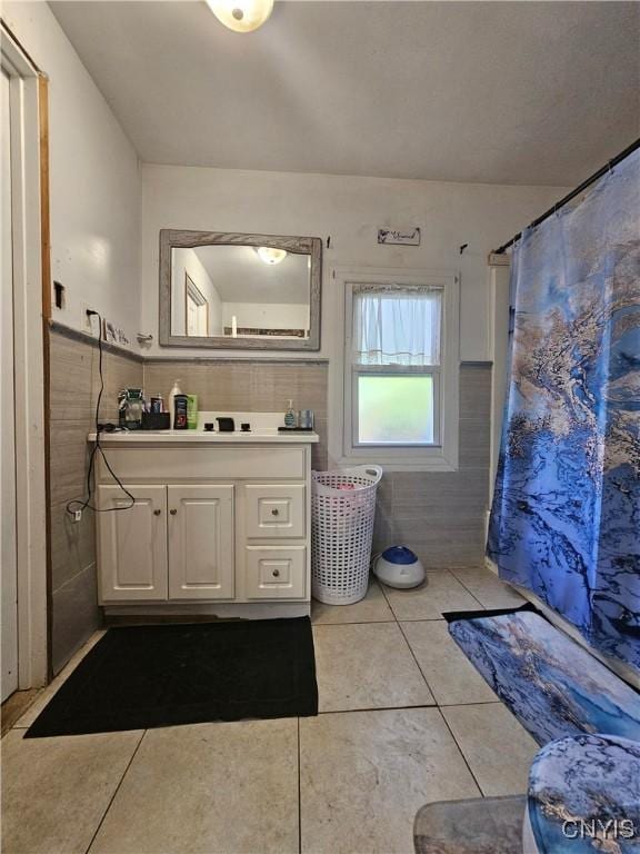 6 Bryant St, Utica, NY 13502 - bathroom featuring tile walls, vanity, tile patterned floors, and curtained shower