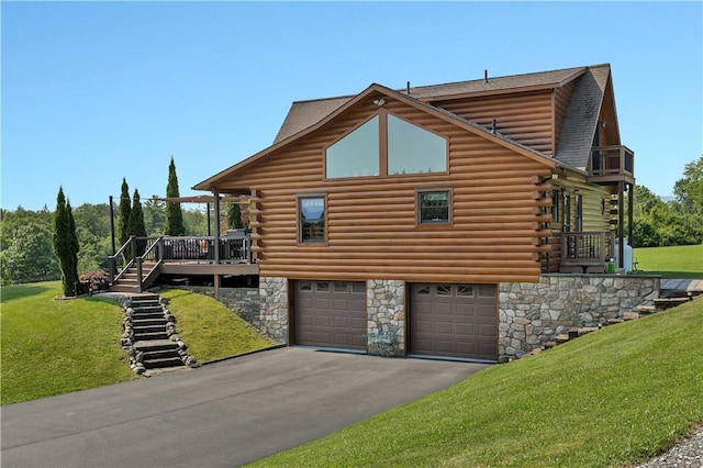 5600 State Route 81, Greenville, NY 12083 - view of property exterior featuring a garage, a lawn, asphalt driveway, and log exterior