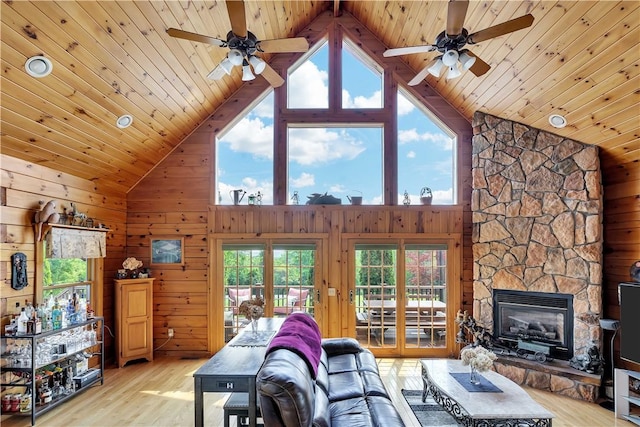 5600 State Route 81, Greenville, NY 12083 - living room with wooden ceiling, ceiling fan, light wood-style flooring, high vaulted ceiling, and wooden walls