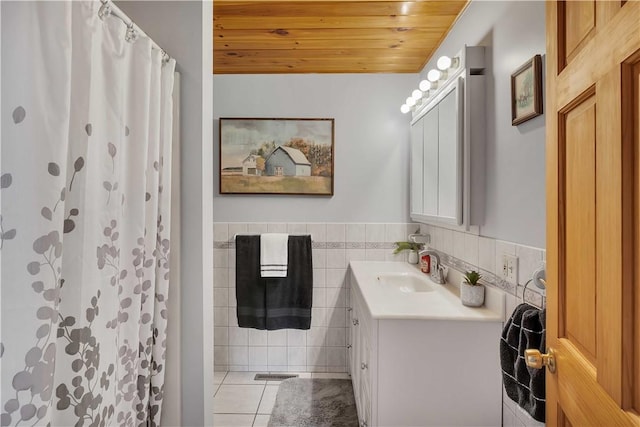 5600 State Route 81, Greenville, NY 12083 - full bathroom featuring wood ceiling, vanity, tile patterned flooring, tile walls, and a shower with shower curtain
