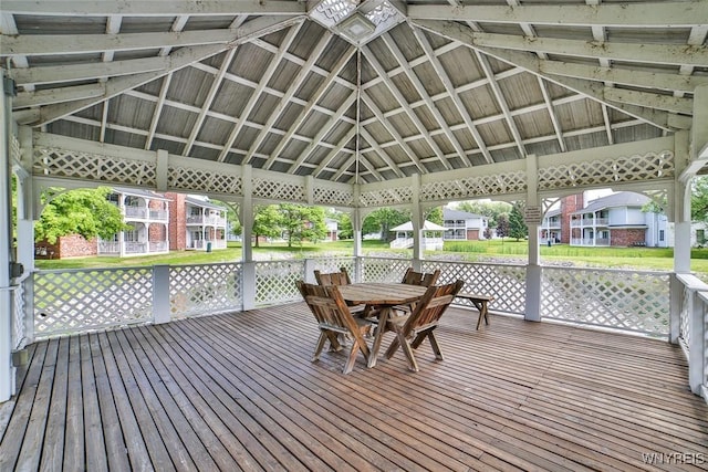 1185 Youngs Rd Unit F, Amherst, NY 14221 - wooden deck with a gazebo, outdoor dining space, and a residential view