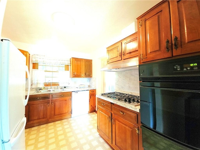 4883 Pinecrest Rd, Veteran, NY 14864 - kitchen featuring white appliances, light flooring, under cabinet range hood, light countertops, and backsplash