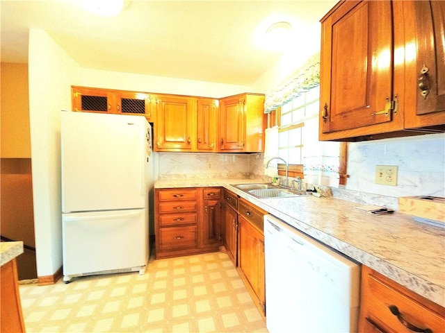 4883 Pinecrest Rd, Veteran, NY 14864 - kitchen with white appliances, light countertops, brown cabinets, and light flooring