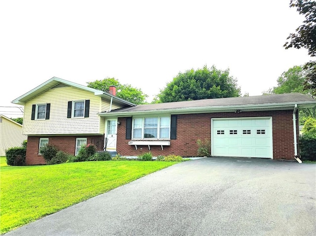 4883 Pinecrest Rd, Veteran, NY 14864 - split level home with brick siding, an attached garage, and asphalt driveway