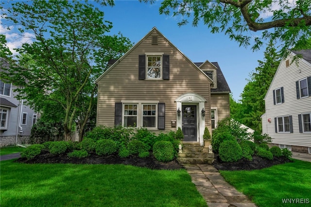 87 Garrison Rd, Amherst, NY 14221 - view of front facade featuring a front yard