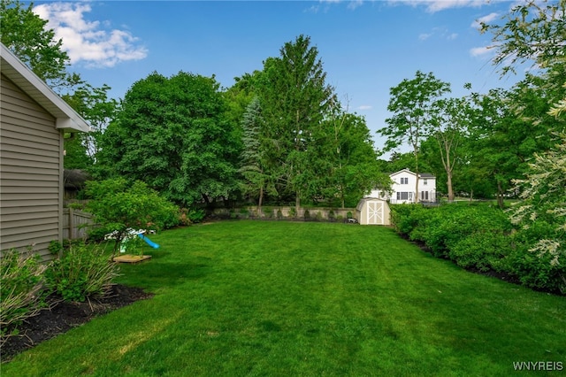 87 Garrison Rd, Amherst, NY 14221 - view of yard with a storage unit