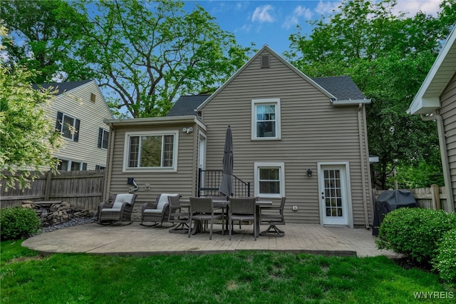 87 Garrison Rd, Amherst, NY 14221 - rear view of property featuring a patio
