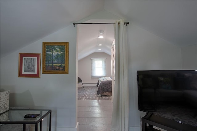 7689 State Highway 80, Springfield, NY 13468 - bedroom with vaulted ceiling and wood finished floors