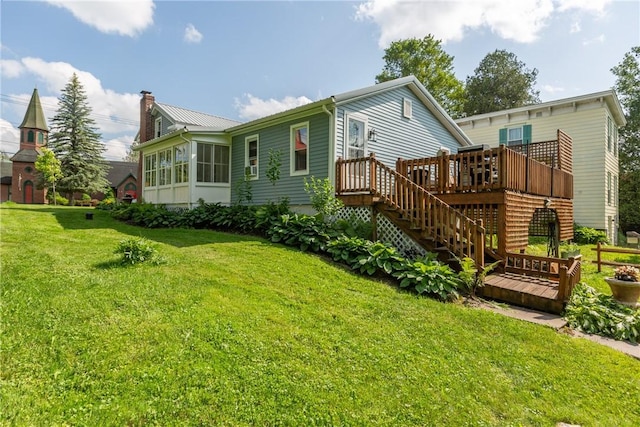 7689 State Highway 80, Springfield, NY 13468 - rear view of house featuring a wooden deck, stairs, a yard, a chimney, and a metal roof