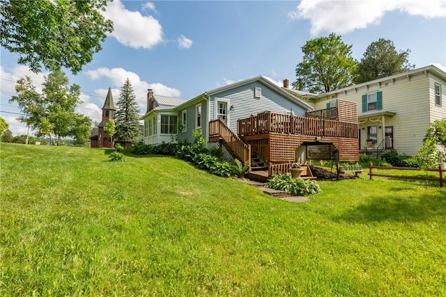 7689 State Highway 80, Springfield, NY 13468 - back of property with stairs, a deck, and a yard