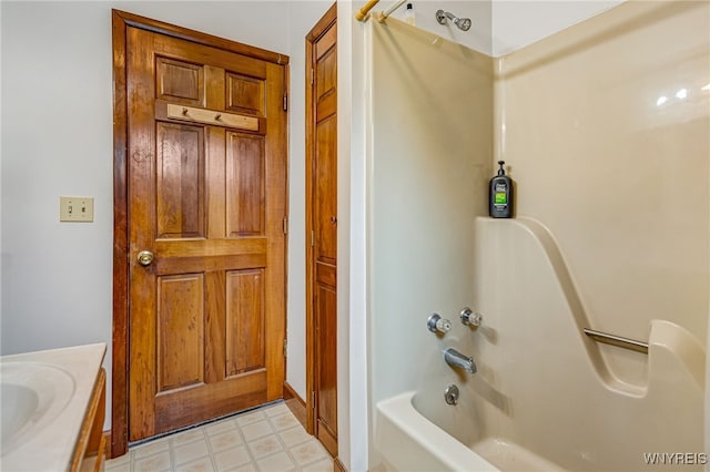 3317 D St, Niagara Falls, NY 14303 - full bathroom with vanity, shower / washtub combination, and tile patterned floors