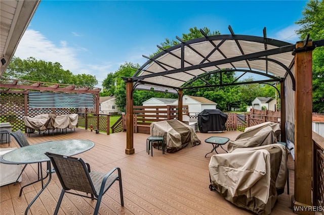 3317 D St, Niagara Falls, NY 14303 - wooden terrace featuring area for grilling and a pergola