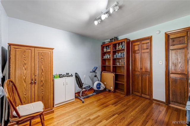 3317 D St, Niagara Falls, NY 14303 - exercise area featuring light wood-style floors and baseboards