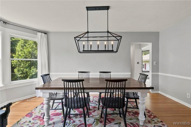 552 Locust St, Lockport-City, NY 14094 - dining space with light wood-style floors