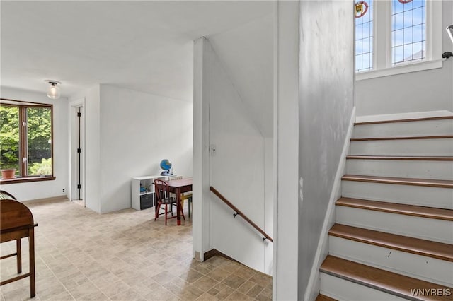 552 Locust St, Lockport-City, NY 14094 - stairway with healthy amount of natural light