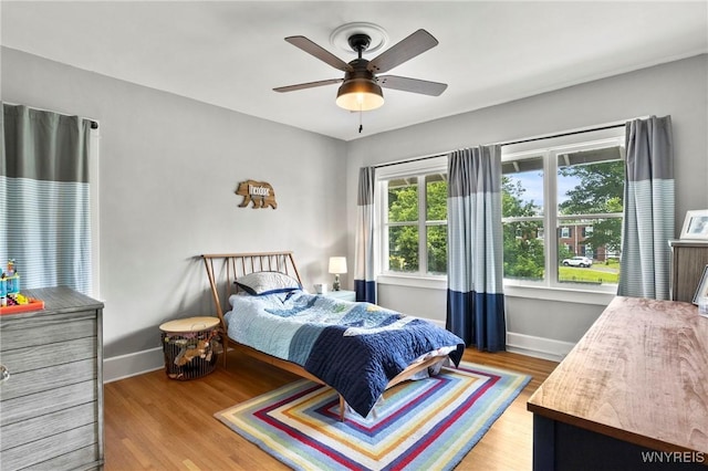 552 Locust St, Lockport-City, NY 14094 - bedroom featuring wood finished floors and ceiling fan