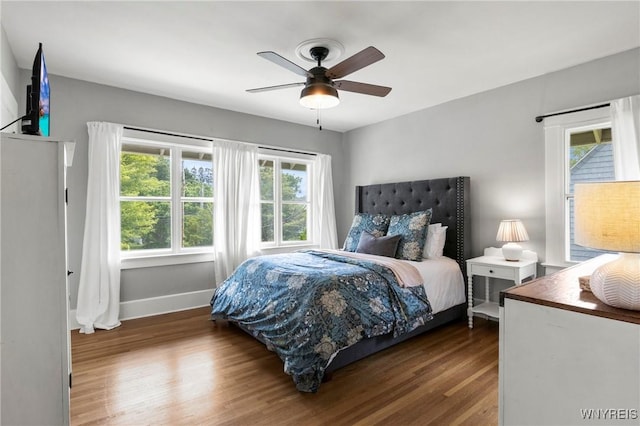 552 Locust St, Lockport-City, NY 14094 - bedroom featuring wood finished floors, multiple windows, and ceiling fan