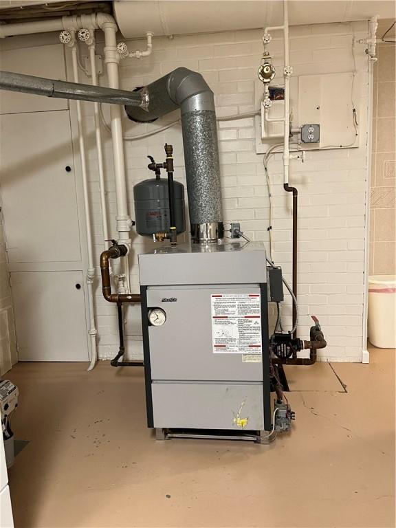 7 Orchard Pl, Bradford-City, PA 16701 - utility room featuring a heating unit