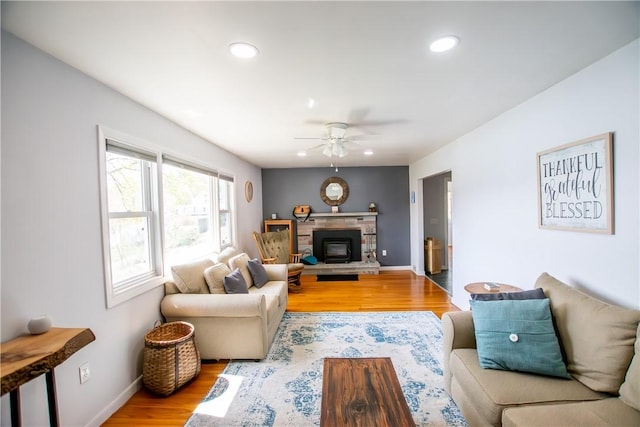 16353 W Lake Rd, Pulteney, NY 14418 - living area featuring wood finished floors, recessed lighting, a ceiling fan, and a glass covered fireplace