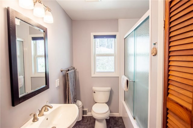 16353 W Lake Rd, Pulteney, NY 14418 - bathroom with toilet and shower / bath combination with glass door