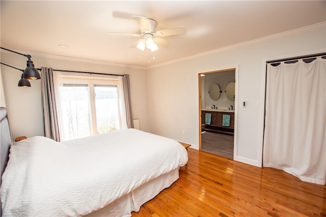 16353 W Lake Rd, Pulteney, NY 14418 - bedroom with light wood-type flooring, crown molding, ensuite bath, and ceiling fan