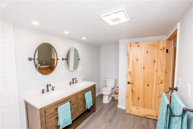 16353 W Lake Rd, Pulteney, NY 14418 - full bathroom with wood finished floors, double vanity, and recessed lighting