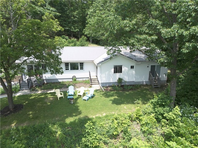 16353 W Lake Rd, Pulteney, NY 14418 - rear view of property featuring a yard, entry steps, and a metal roof
