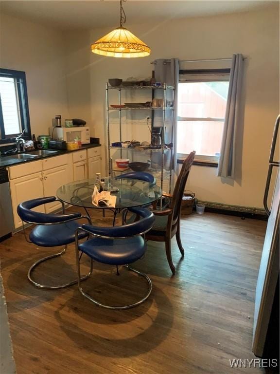 995 Tonawanda St, Buffalo, NY 14207 - dining space featuring healthy amount of natural light and wood finished floors