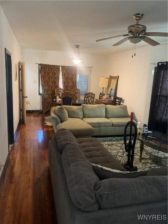 995 Tonawanda St, Buffalo, NY 14207 - living area with dark wood finished floors and a ceiling fan