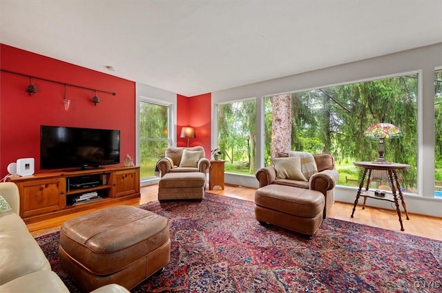 3864 Bristol Rd, Kirkland, NY 13323 - living area featuring plenty of natural light and wood finished floors
