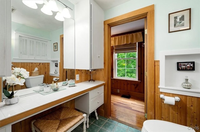 3864 Bristol Rd, Kirkland, NY 13323 - bathroom with toilet and wood walls