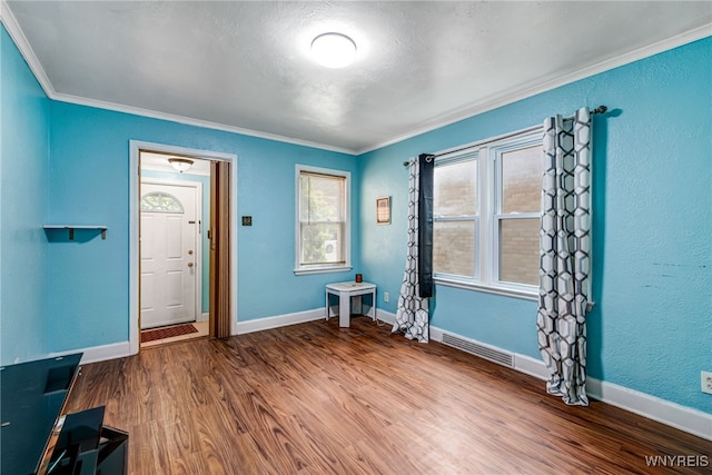2776 Forest Ave, Niagara Falls, NY 14303 - spare room featuring ornamental molding and wood finished floors