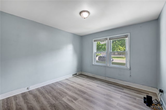 2776 Forest Ave, Niagara Falls, NY 14303 - spare room featuring baseboards and wood finished floors
